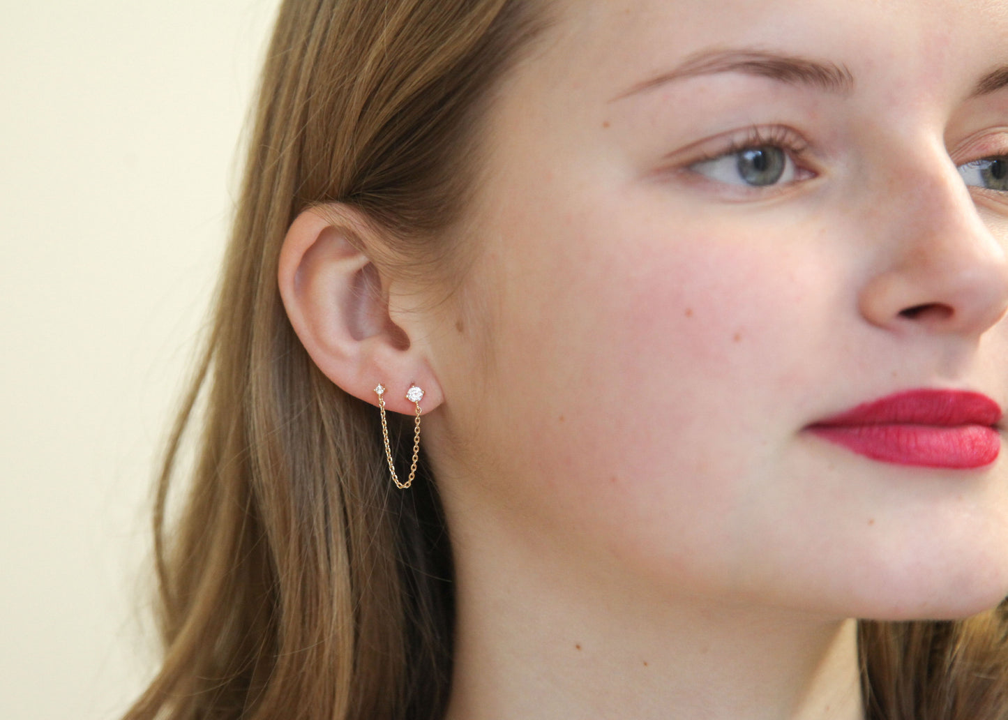Boucle d'oreille double chaîne plaqué or