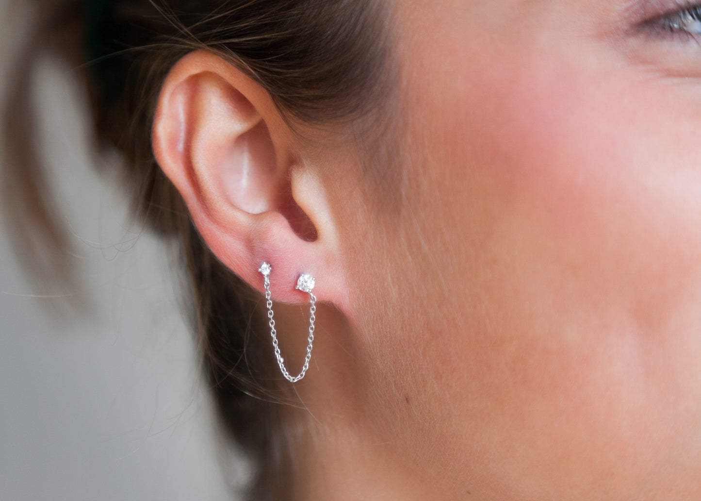 Boucle d'oreille double trous & chaîne en argent