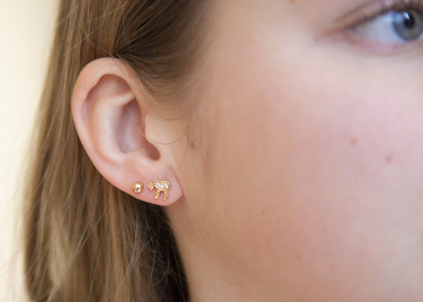 Boucles d’oreilles en plaqué or serties de zircons - Symbole Haï