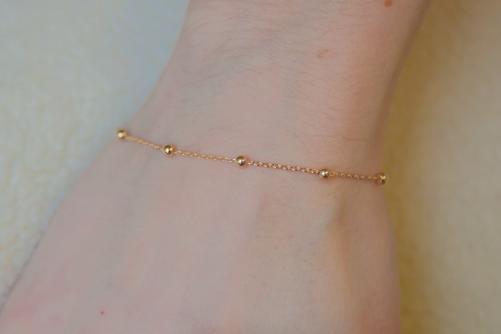 Bracelet petites boules plaqué or