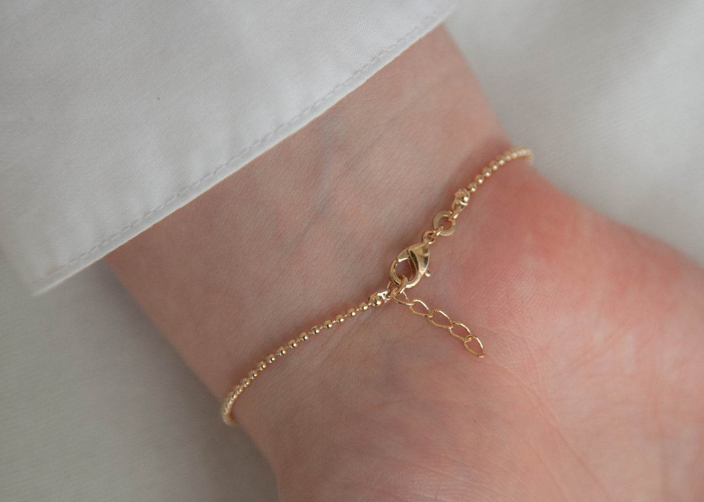 Bracelet petites boules plaqué or