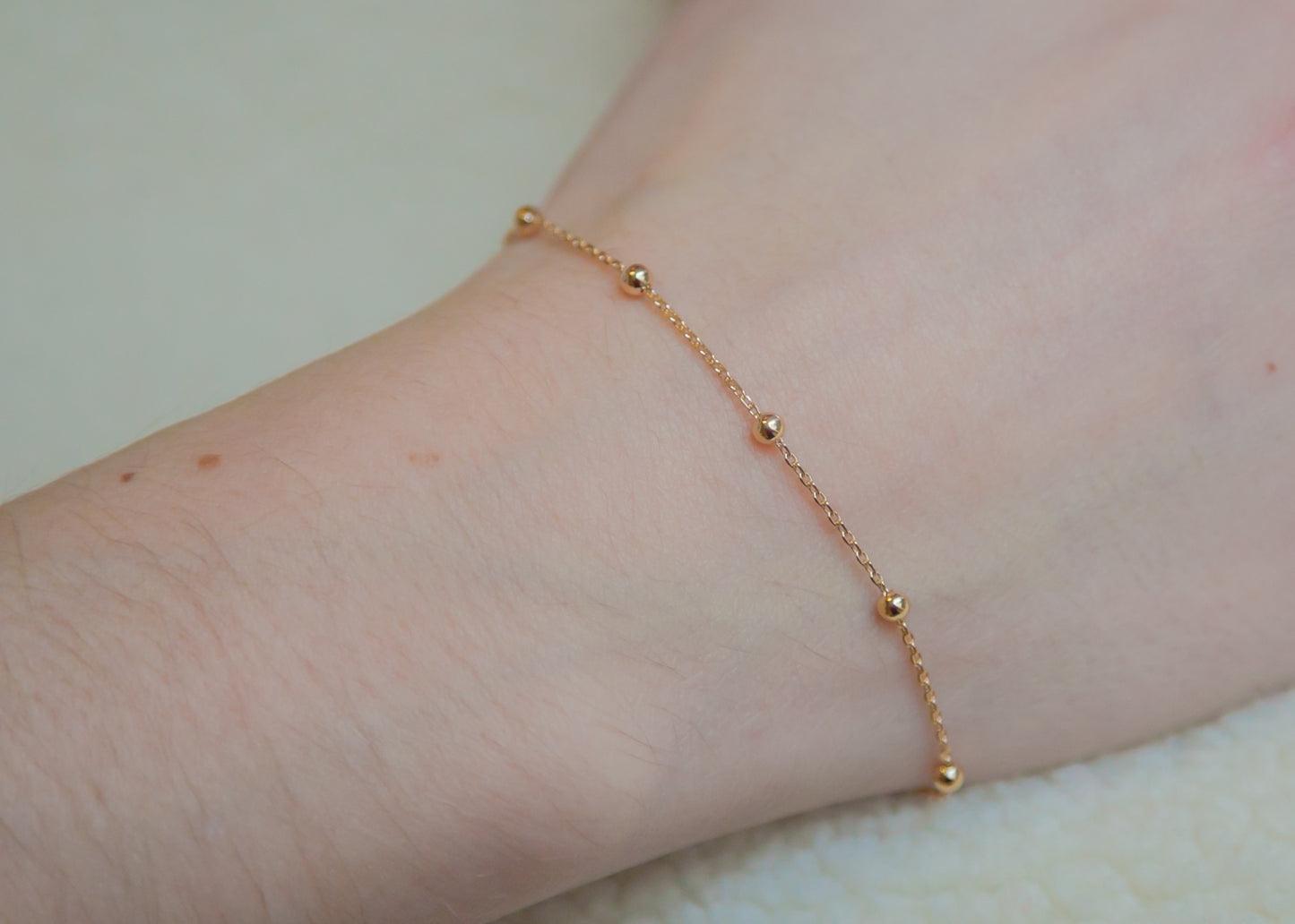 Bracelet petites boules plaqué or