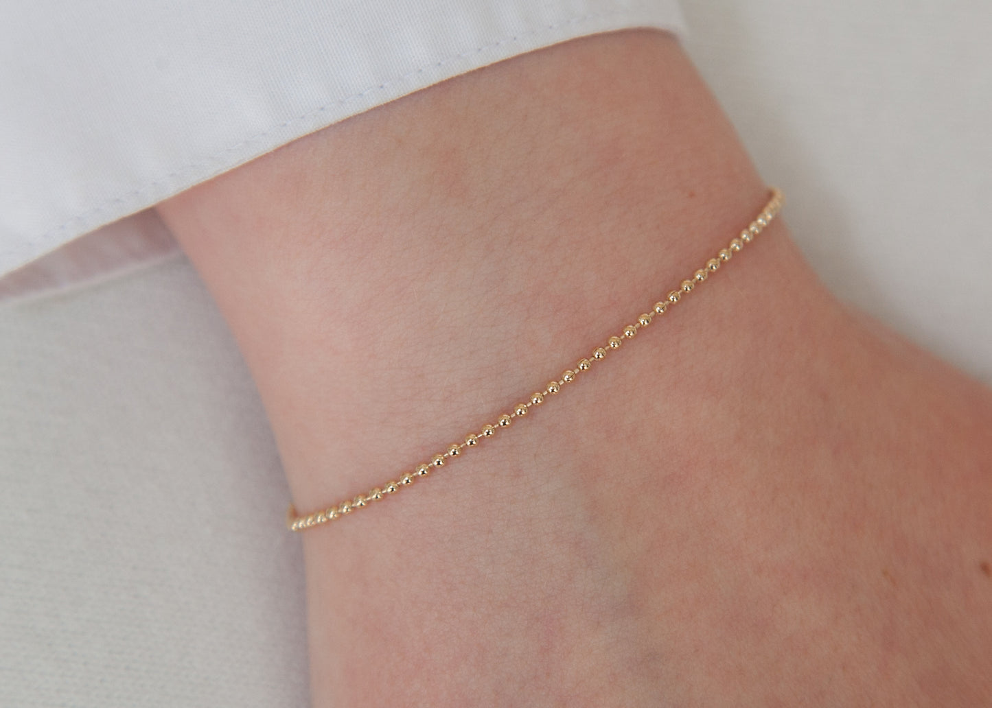 Bracelet petites boules plaqué or