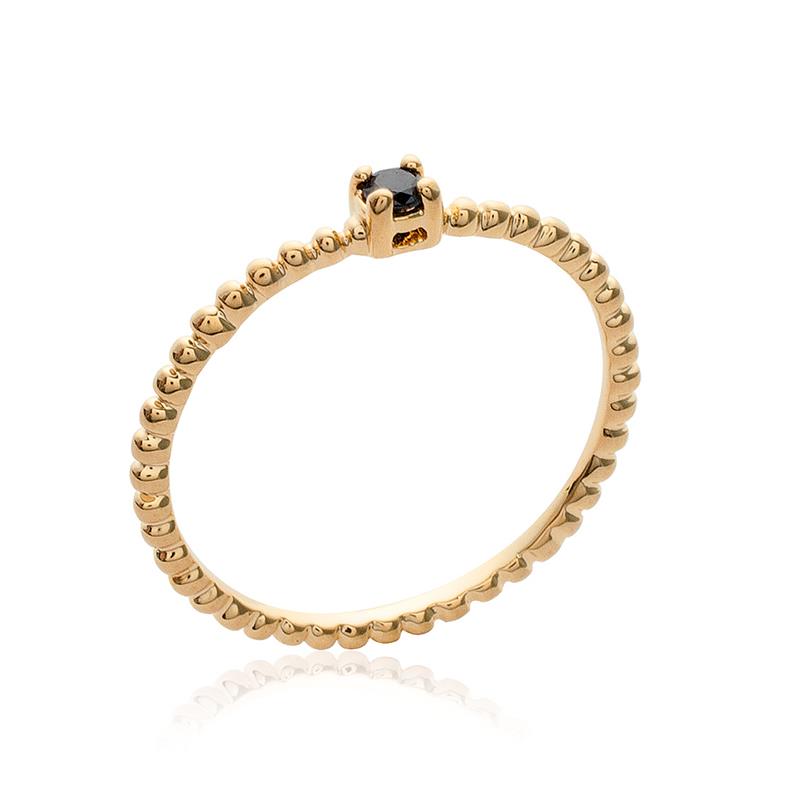 Bague fine perles sertie d'un zircon plaqué or jaune