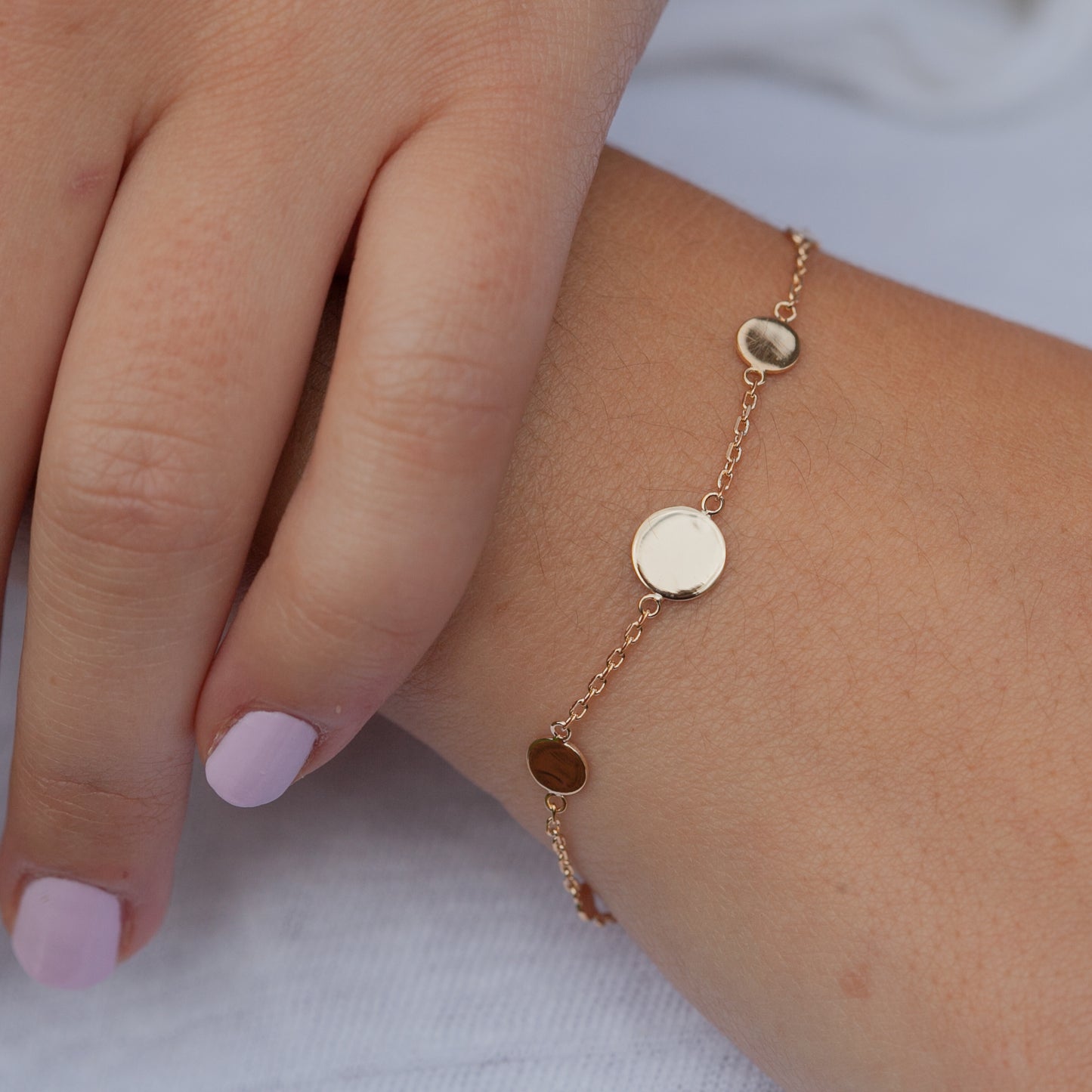 Bracelet 7 pastilles plaqué or