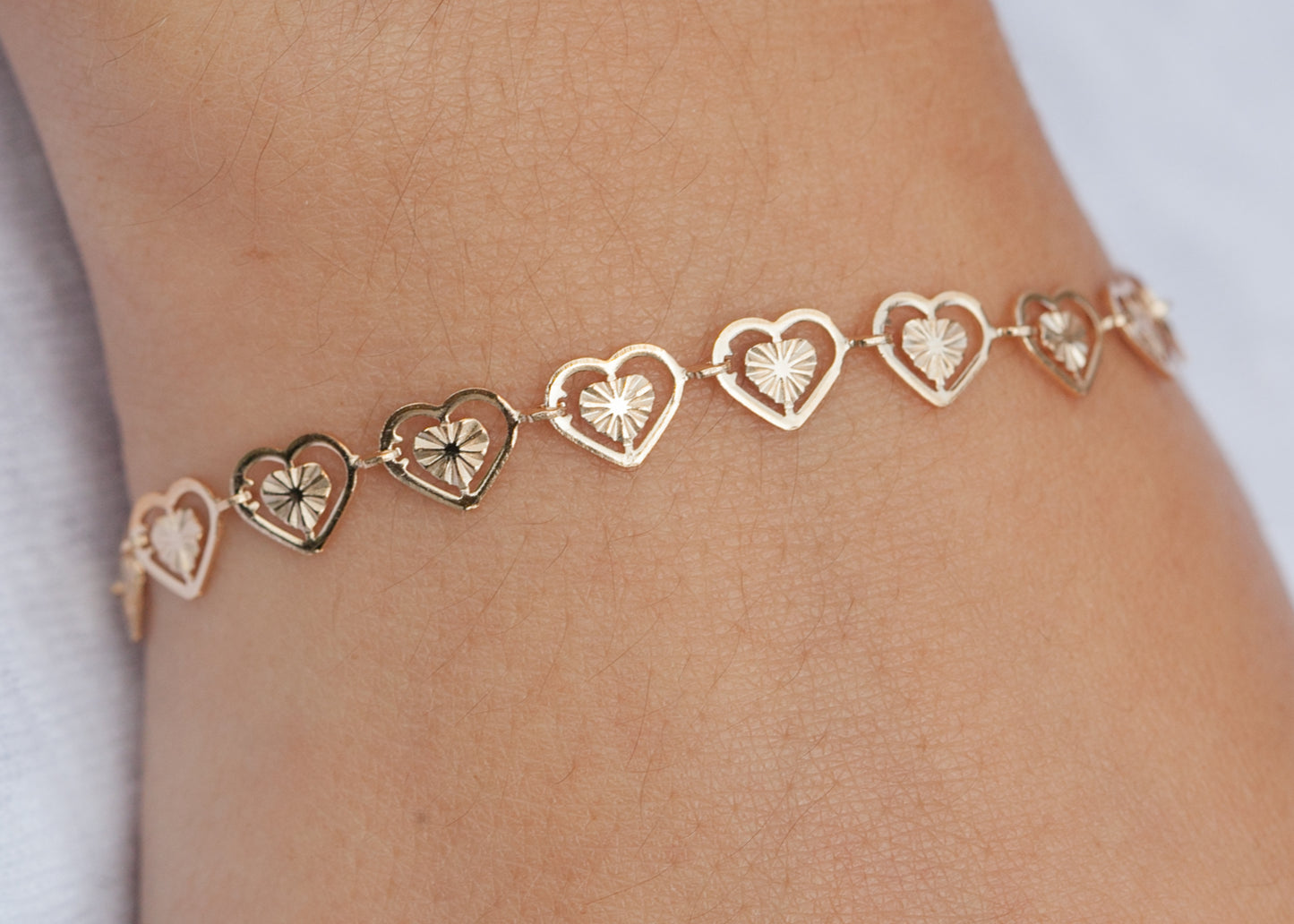 bracelet coeurs plaqué or