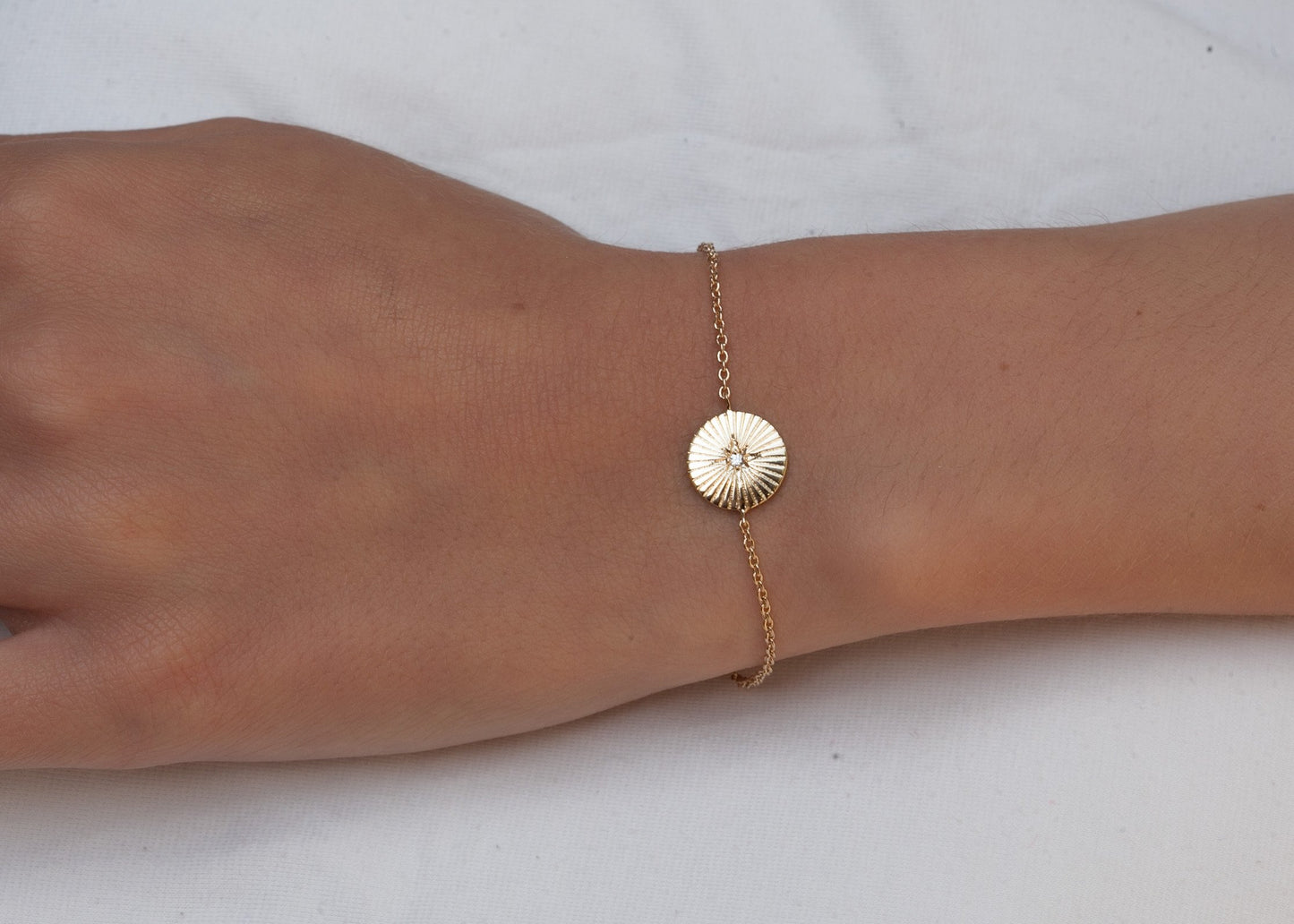 Bracelet soleil étoile du nord plaqué or