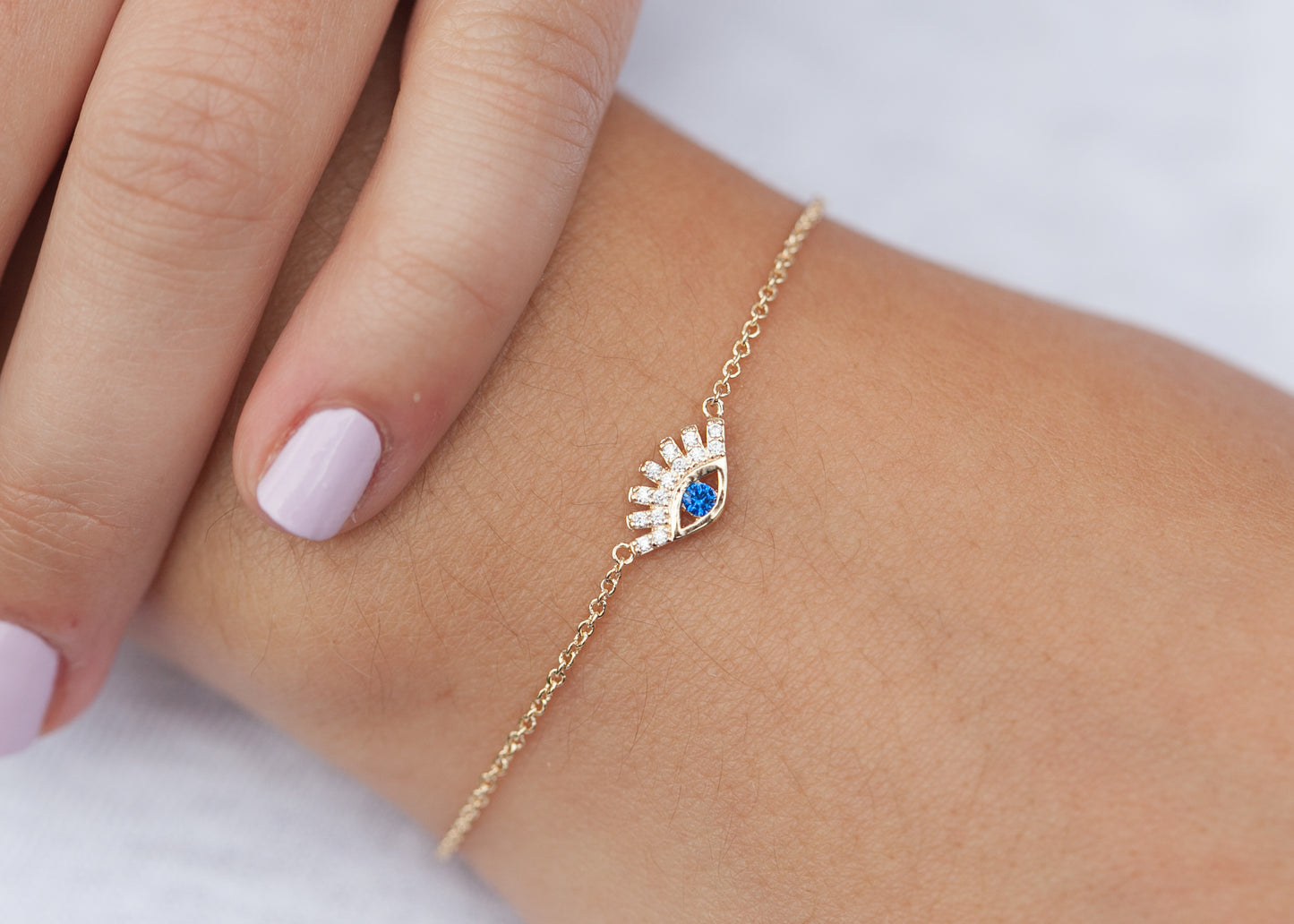 Bracelet oeil bleu serti de zircons plaqué or - Bracelet porte-bonheur