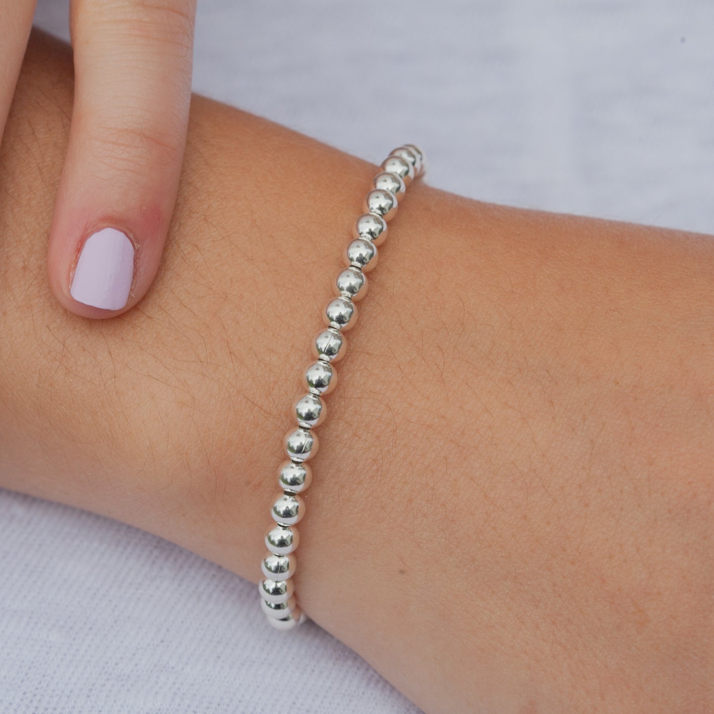 Bracelet perles d'argent véritable