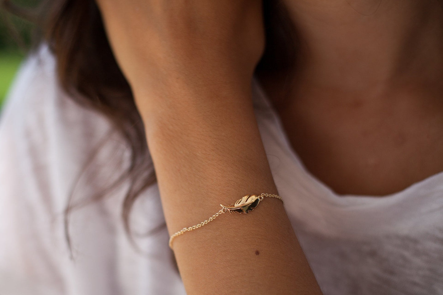 Bracelet plume plaqué or