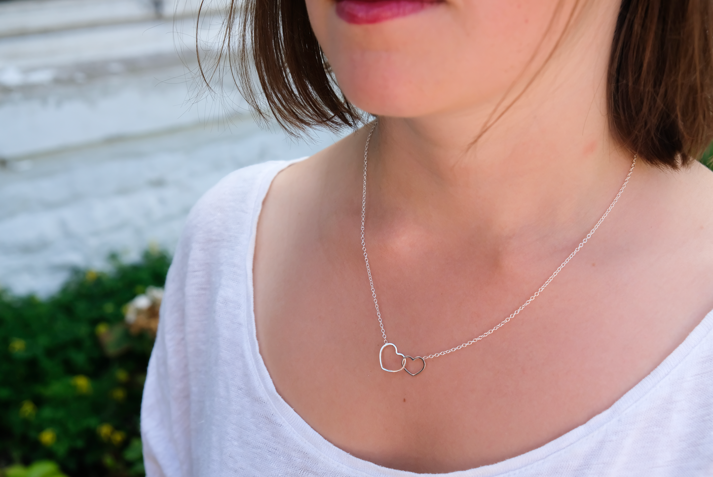 Collier deux coeurs entrelacés en argent