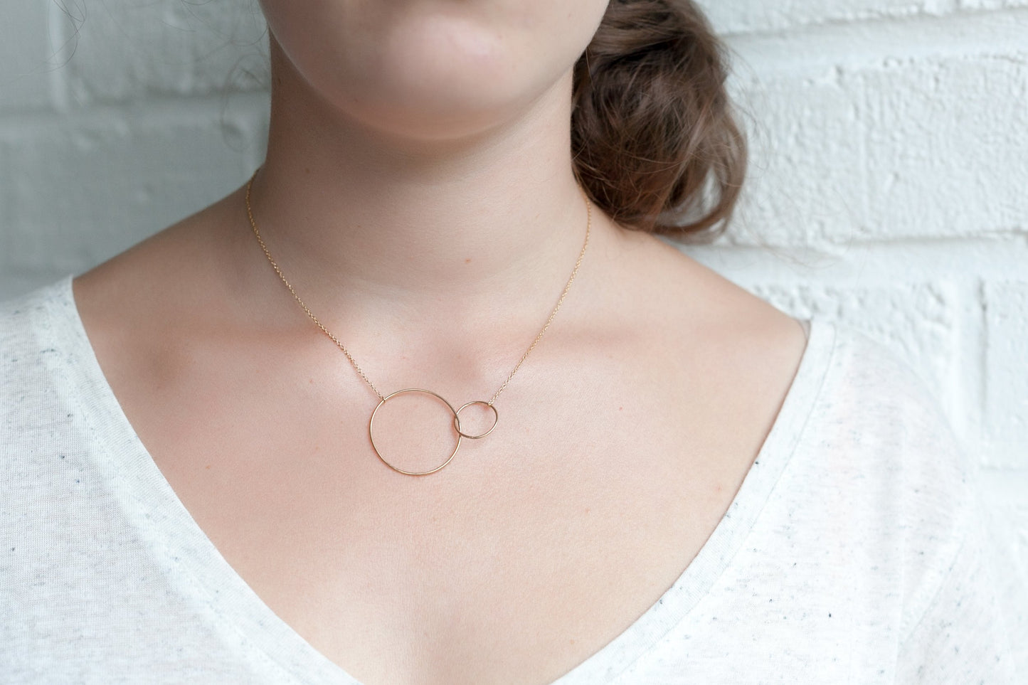 Collier 2 anneaux entrelacés plaqué or