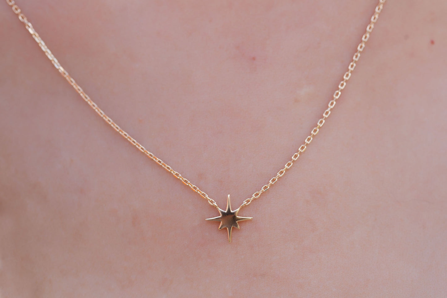Collier étoile du nord plaqué or
