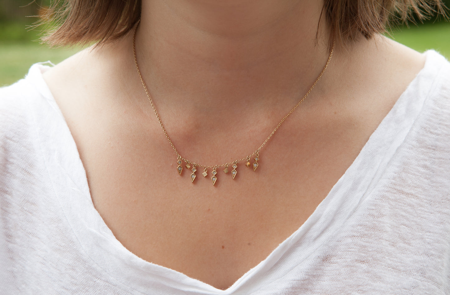 Collier pampilles serti de zircons plaqué or