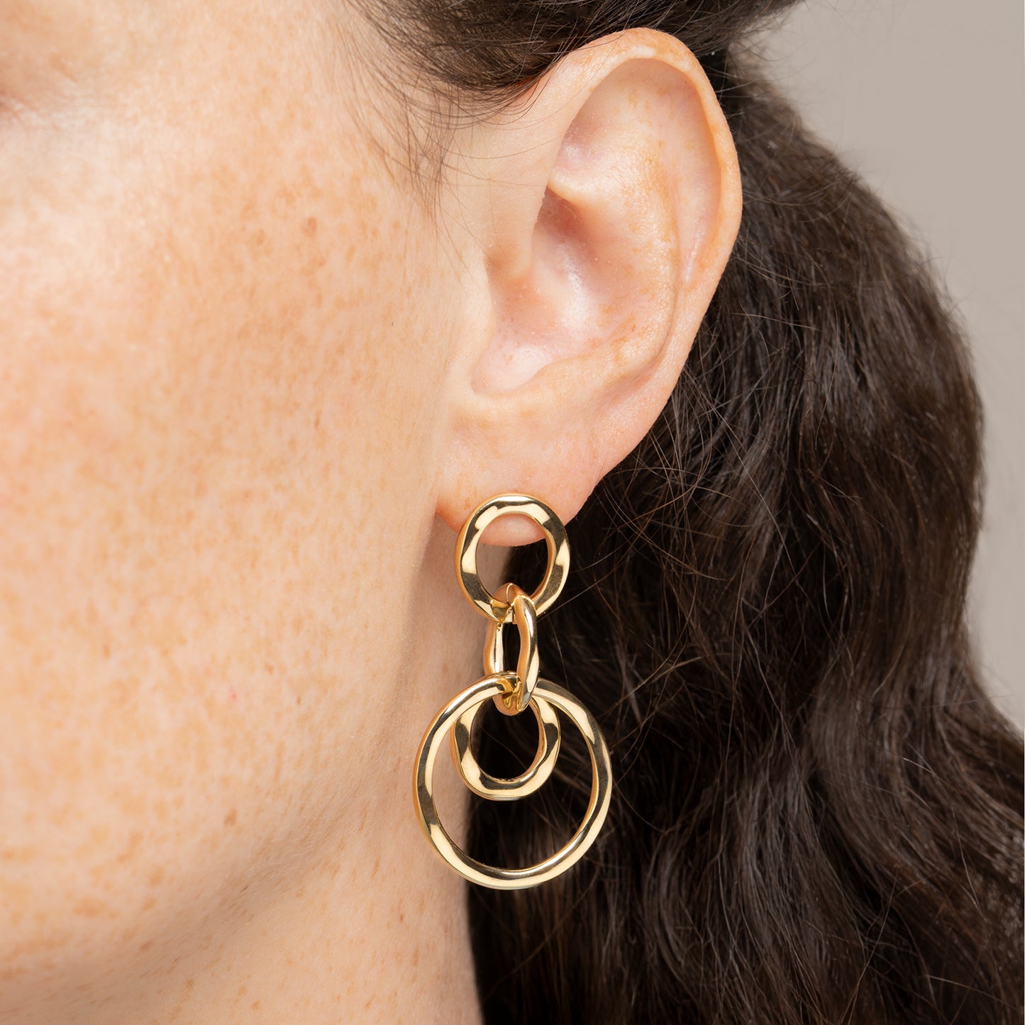 Boucles d'oreilles pendantes 4 ronds en acier doré