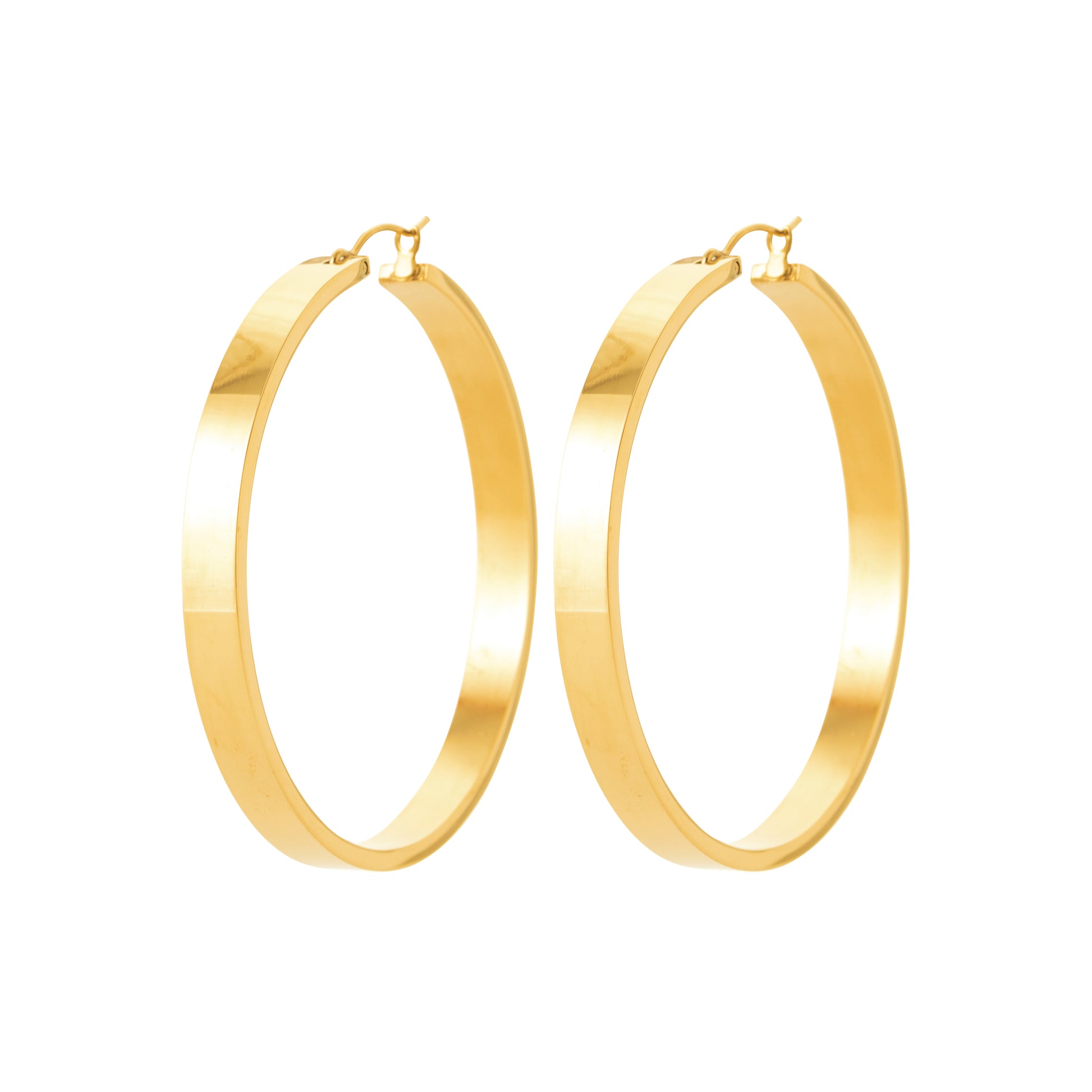 Boucles d’oreilles créoles larges dorées – bijou intemporel et élégant