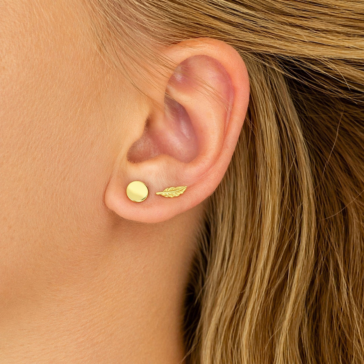 Boucles d'oreilles plume plaqué or