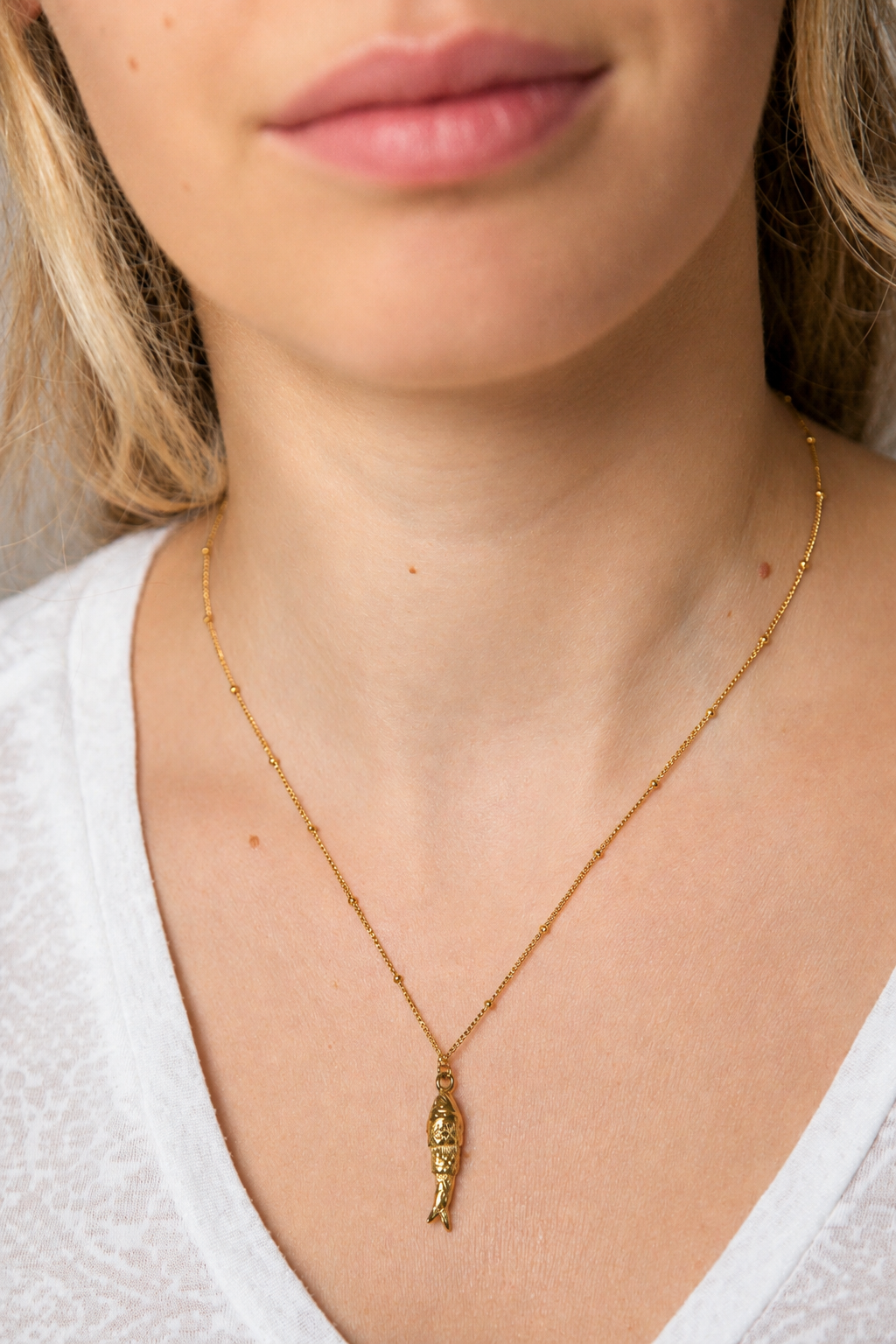 Collier Poisson en acier inoxydable doré