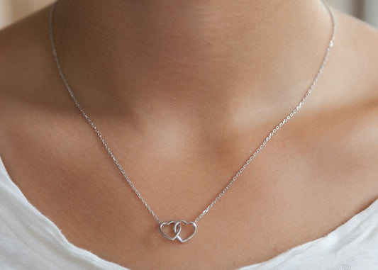 Collier 2 coeurs entrelacés en argent