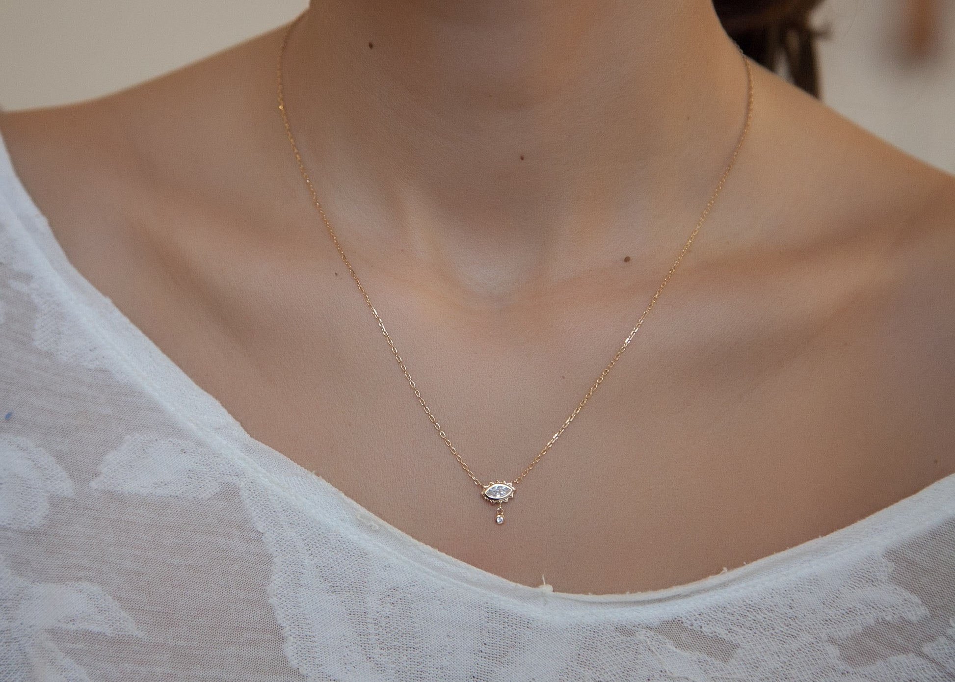 Collier oeil serti de zircons plaqué or - Collier porte-bonheur