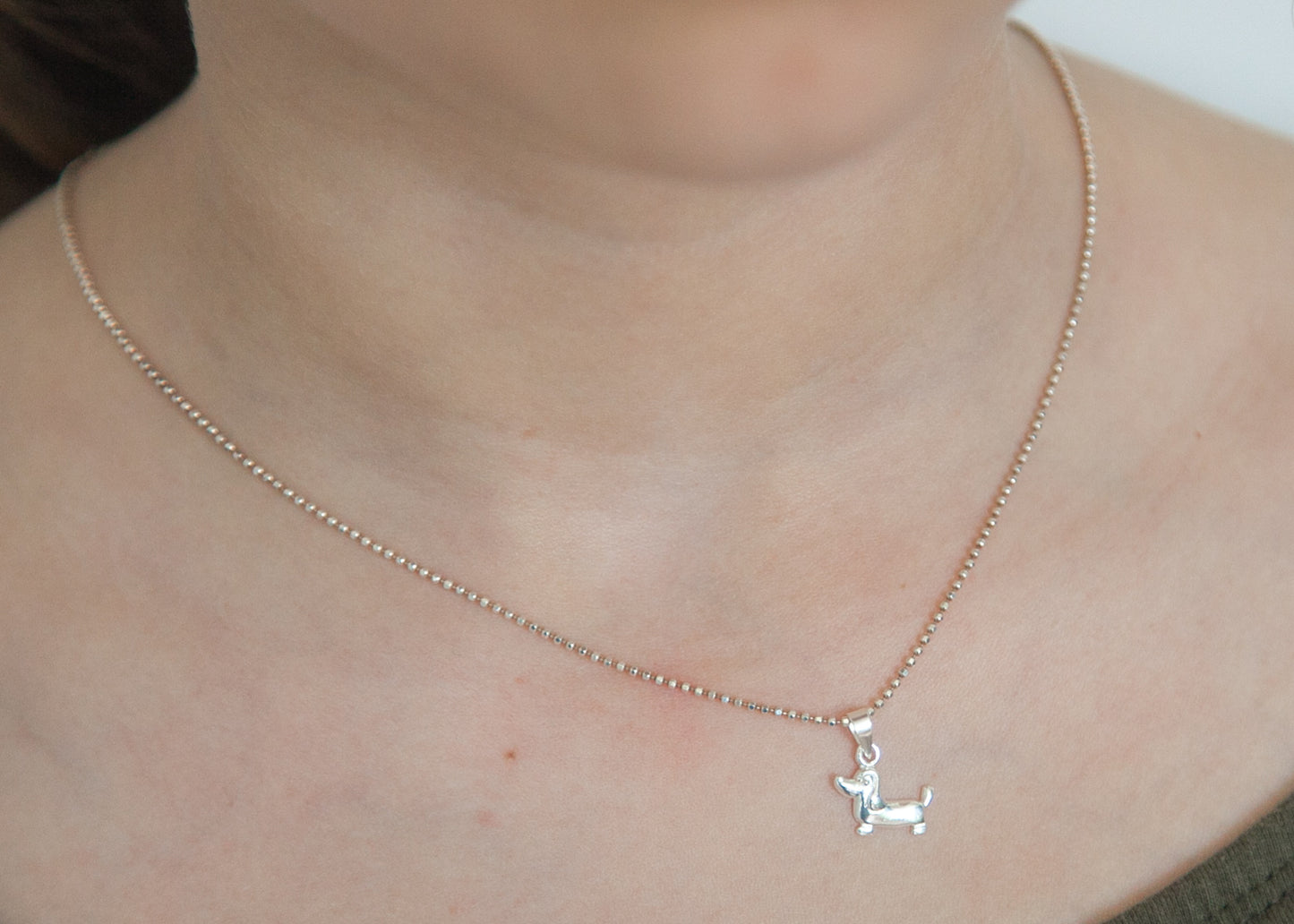 Collier pendentif teckel en argent