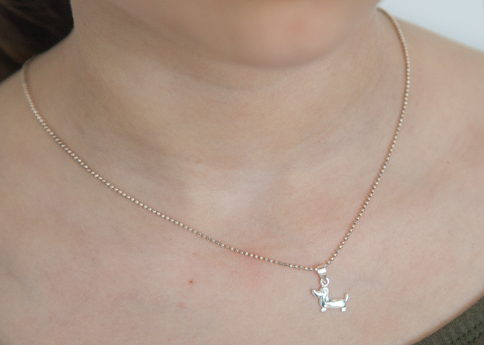 Collier pendentif teckel en argent