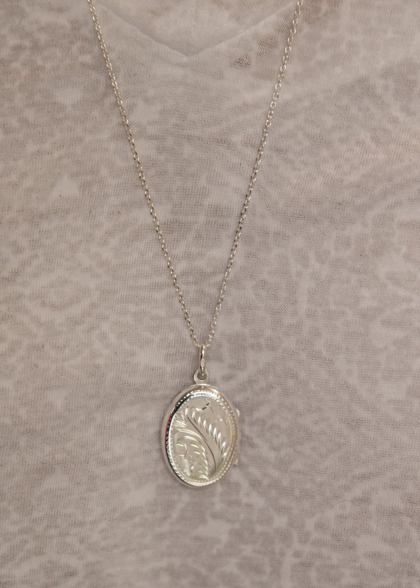 Sautoir pendentif porte-photo en argent