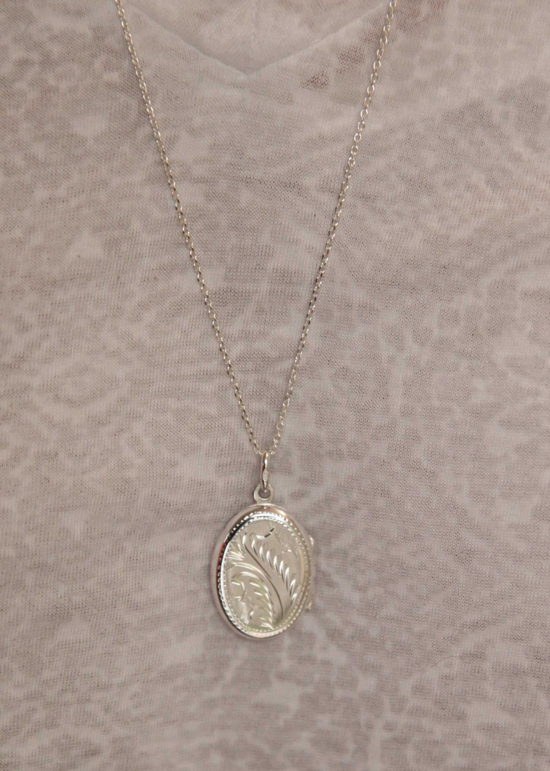 Sautoir pendentif porte-photo en argent