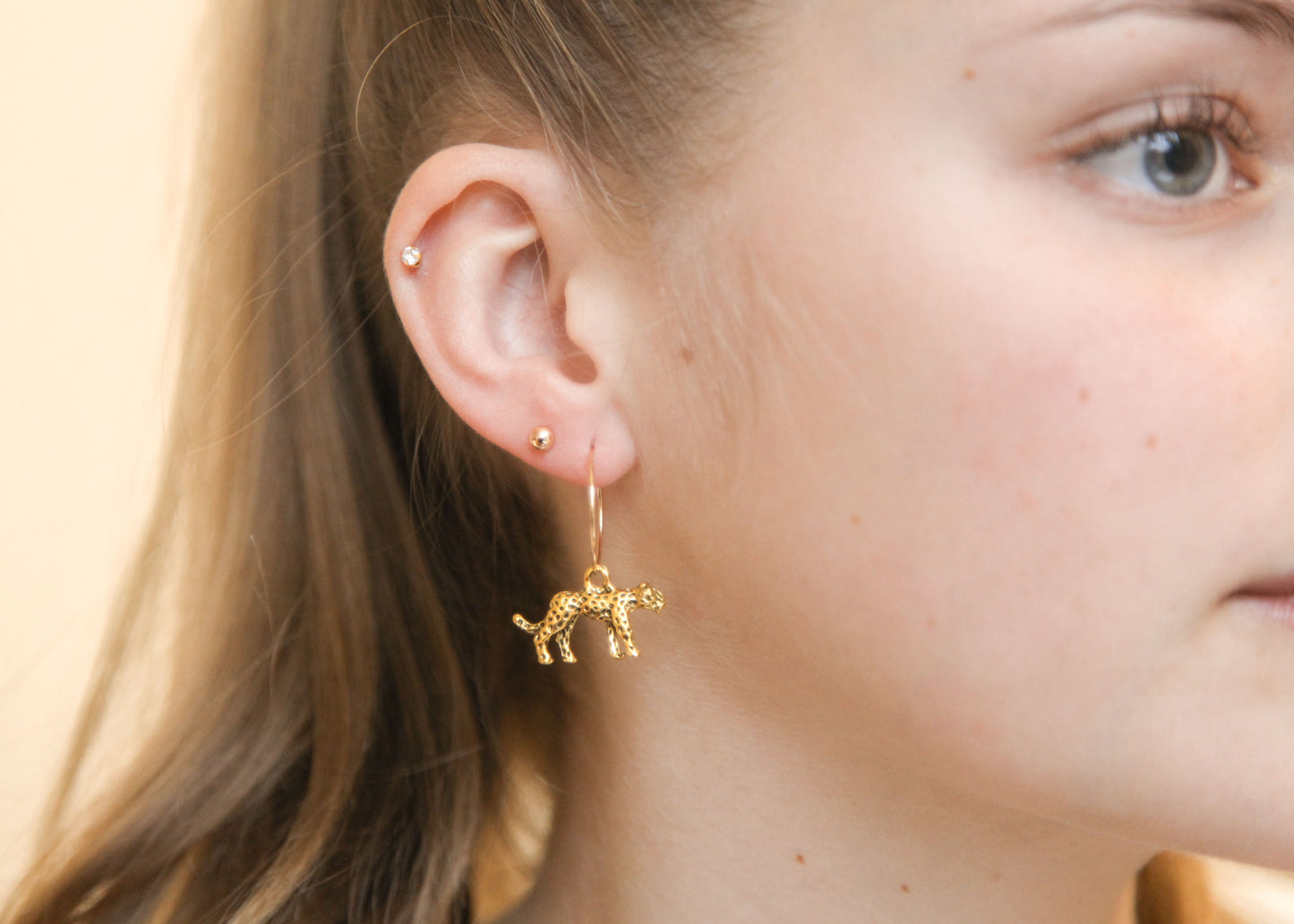 Boucles d’oreilles créoles Léopard plaqué or