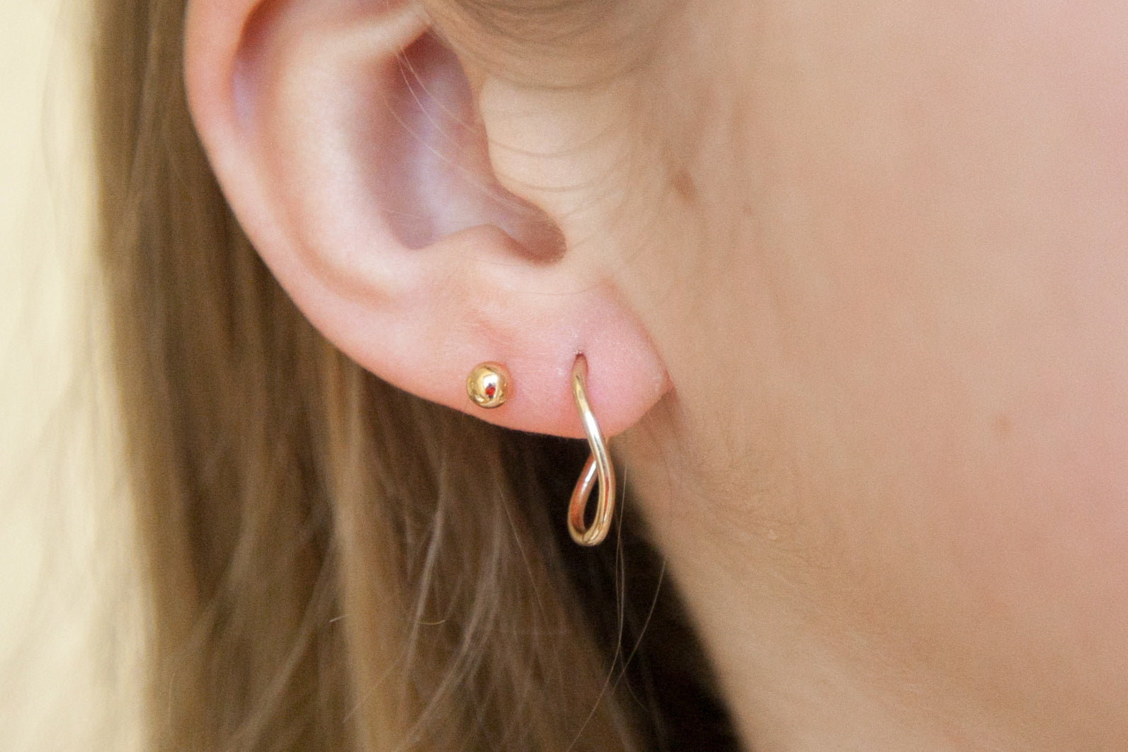 Boucles d'oreilles créoles infini plaqué or