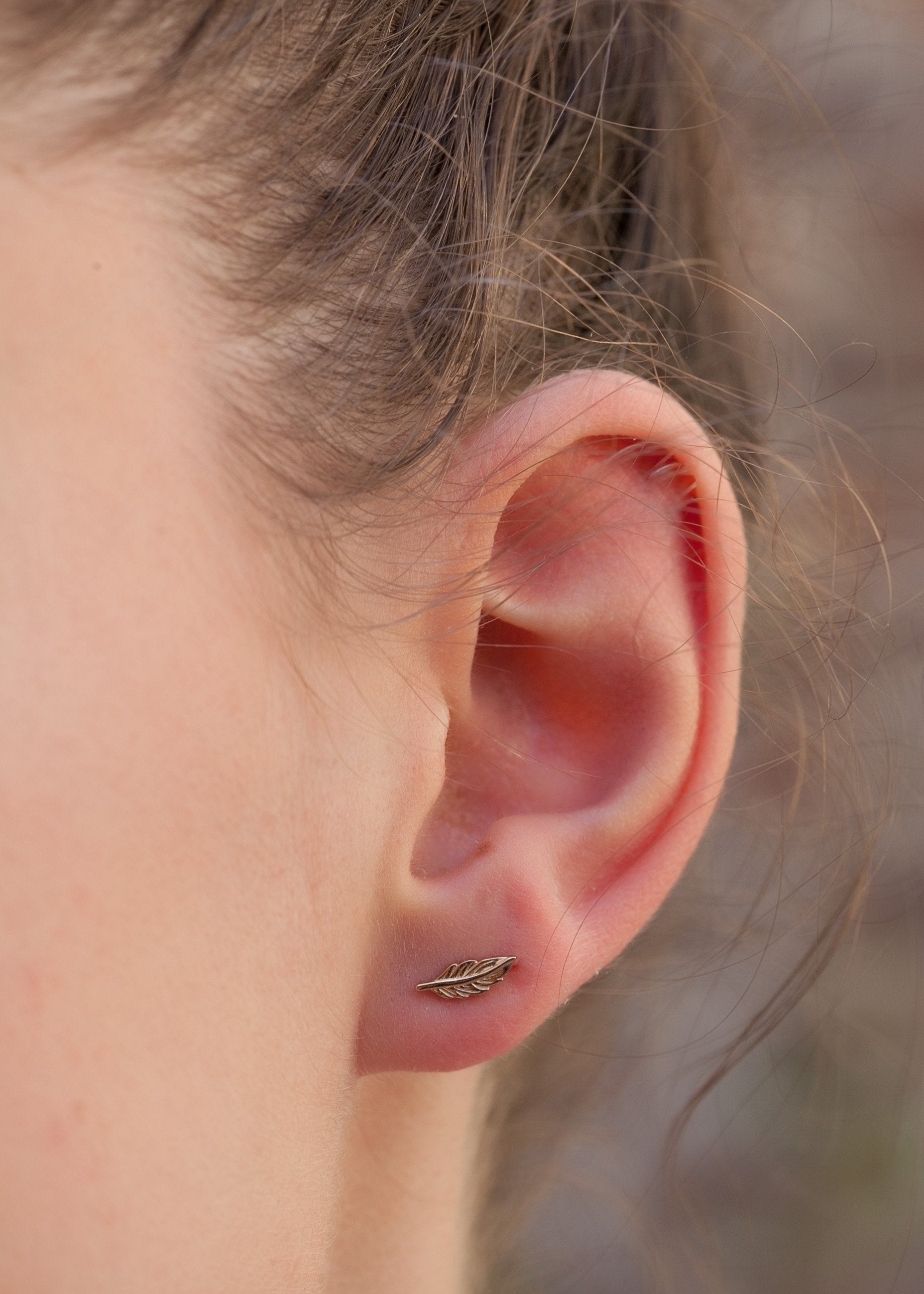 Boucles d'oreilles plume plaqué or