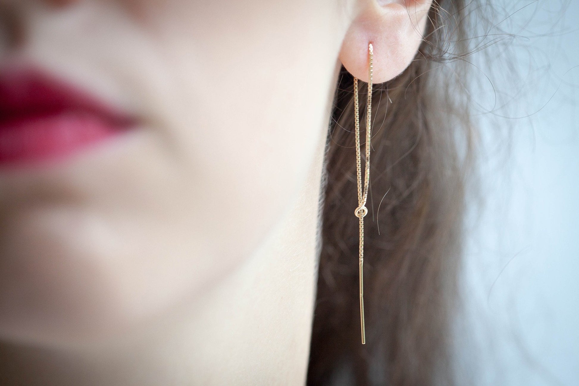 Boucles d'oreilles chaîne traversante plaqué or