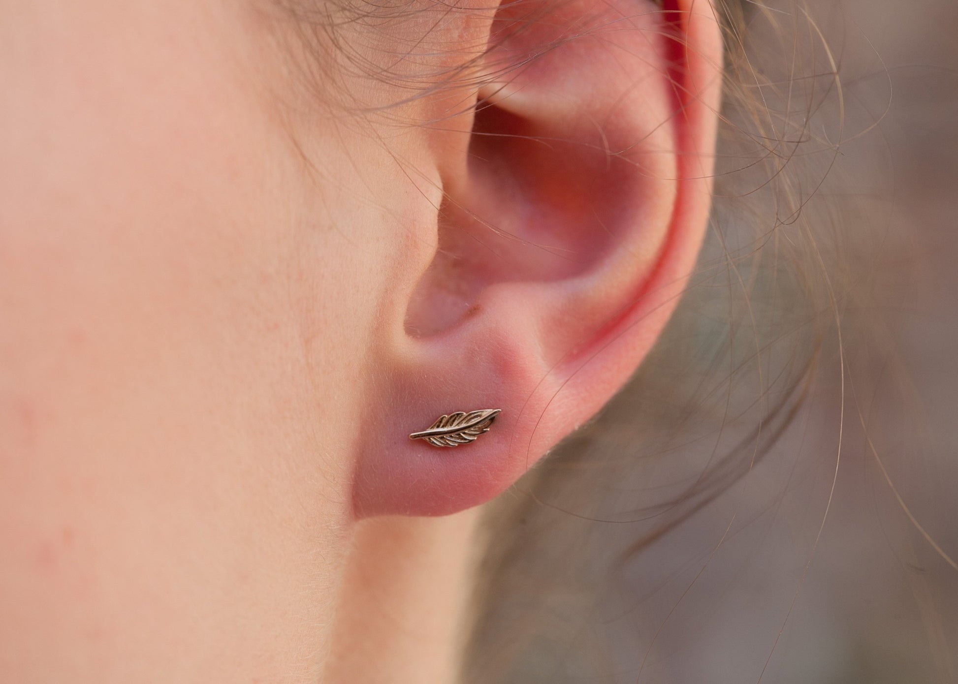 Boucles d'oreilles plume plaqué or