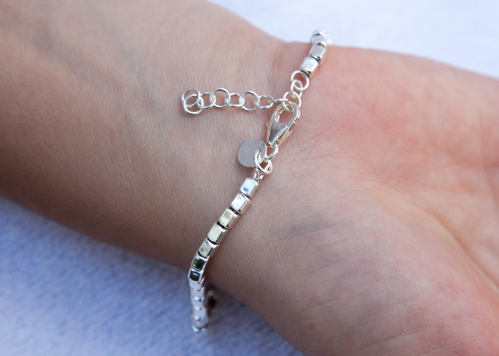 Bracelet perles carrées en argent