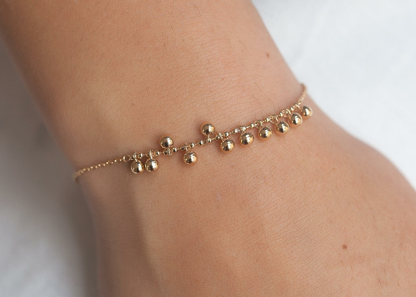 Bracelet boules plaqué or 18 carats