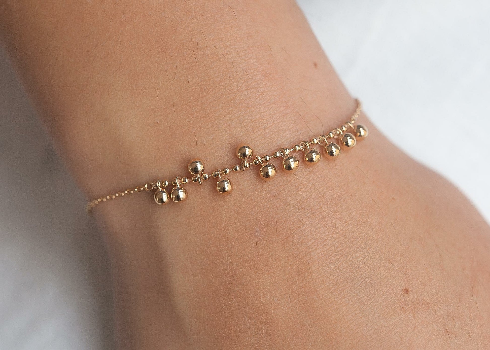 Bracelet boules plaqué or 18 carats