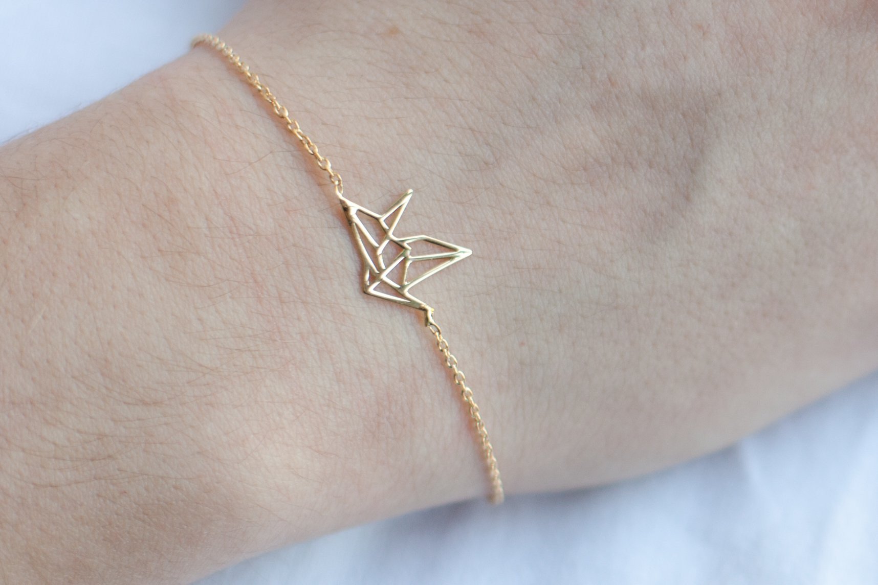 Bracelet grue origami plaqué or
