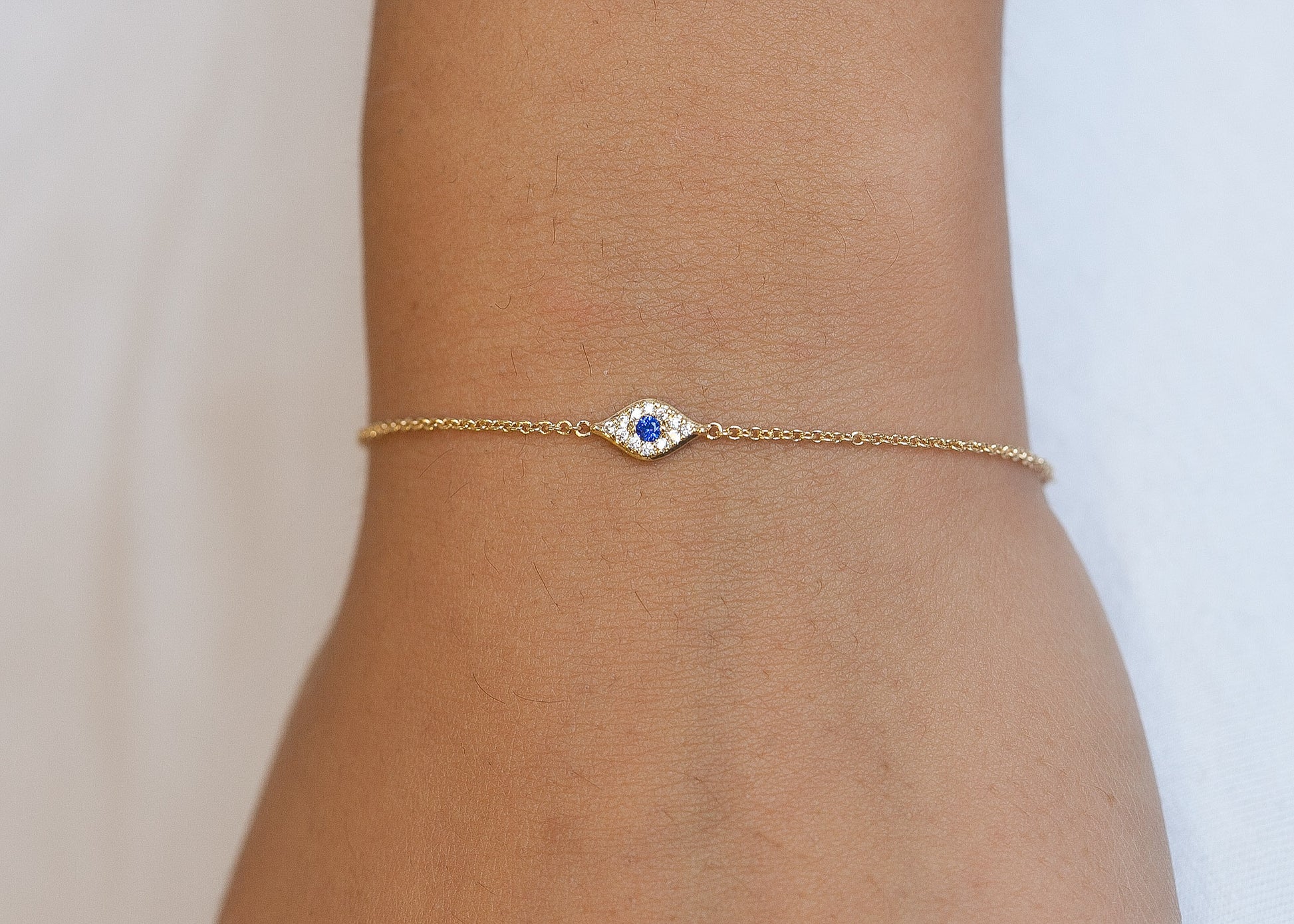 Bracelet oeil bleu serti de zircons plaqué or - Bracelet porte-bonheur