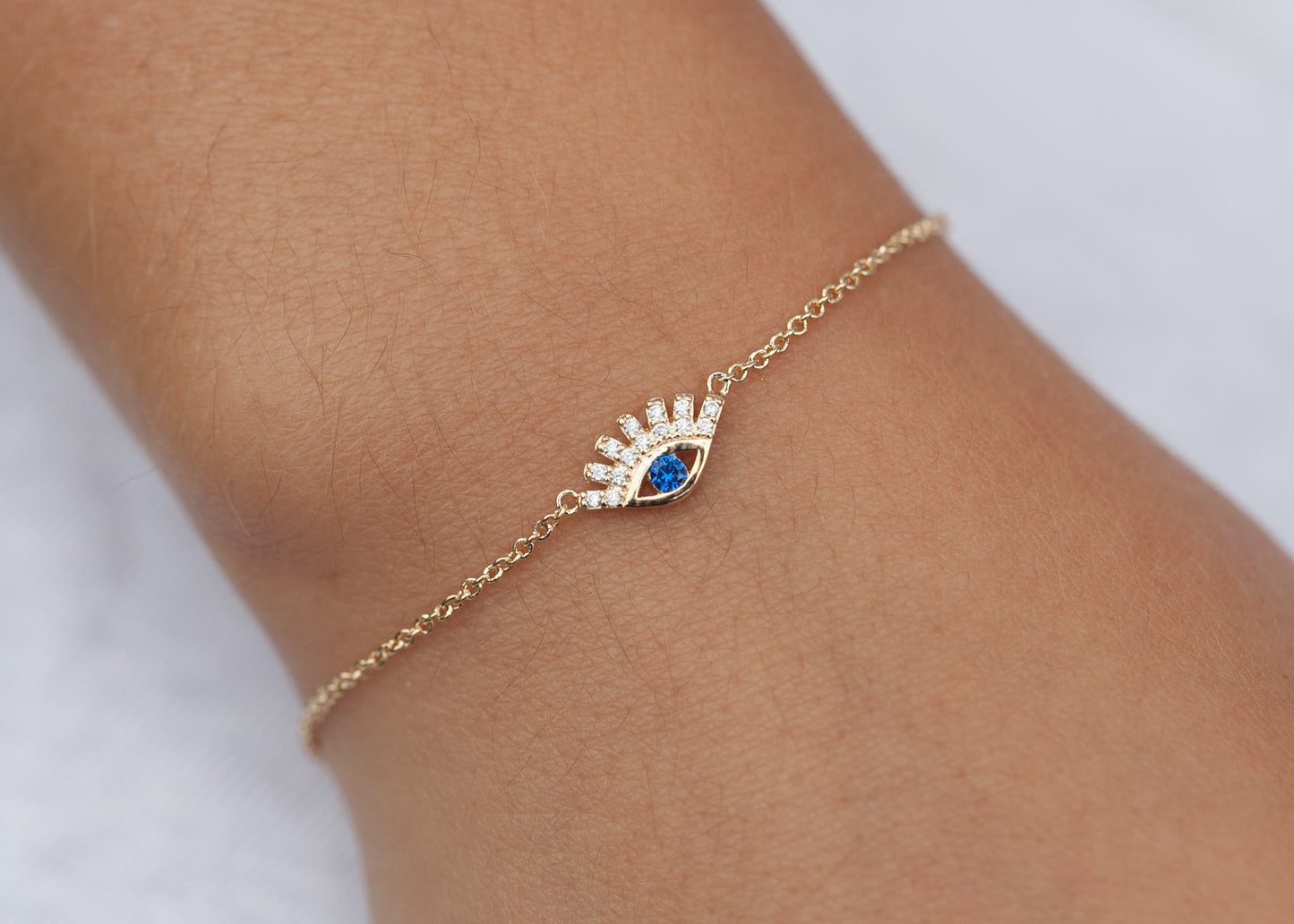 Bracelet oeil bleu serti de zircons plaqué or - Bracelet porte-bonheur