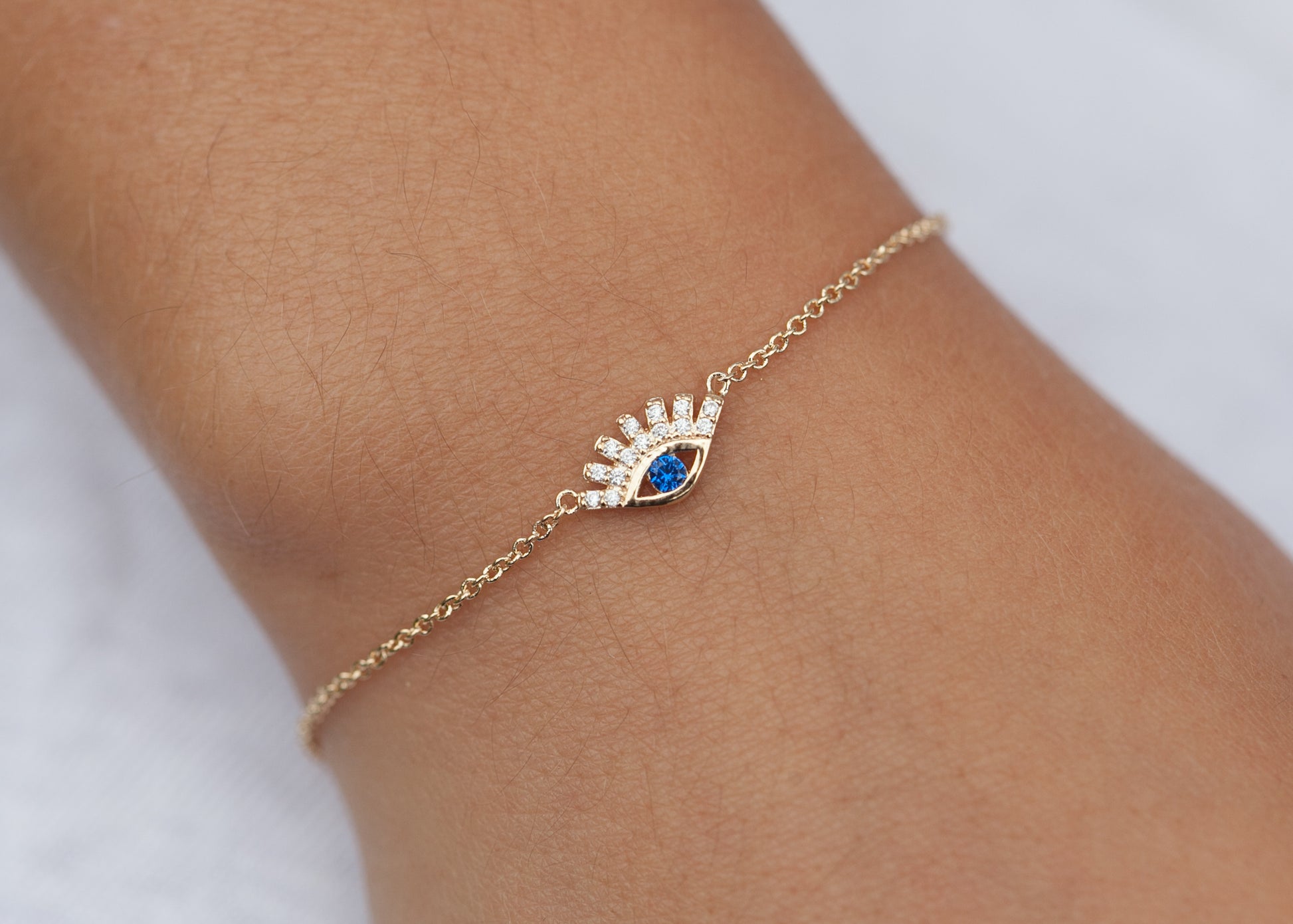 Bracelet oeil bleu serti de zircons plaqué or - Bracelet porte-bonheur