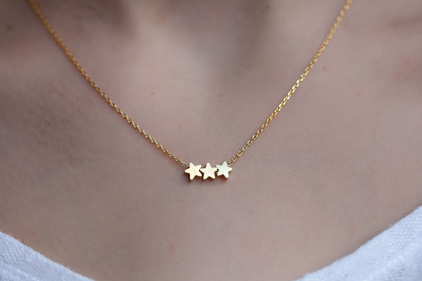 collier 3 étoiles doré 7 bis