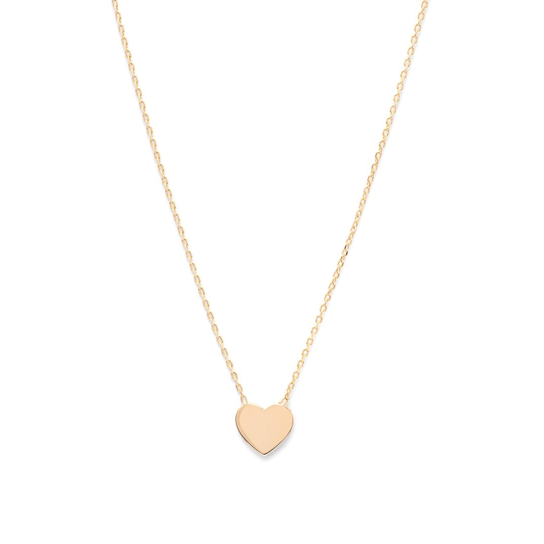 Très joli collier fin plaqué or garanti 10 ans avec un petit coeur.