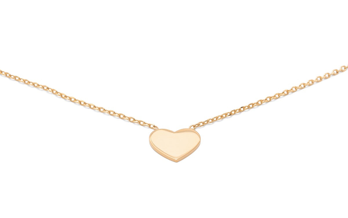 Très joli collier fin plaqué or garanti 10 ans avec un petit coeur.