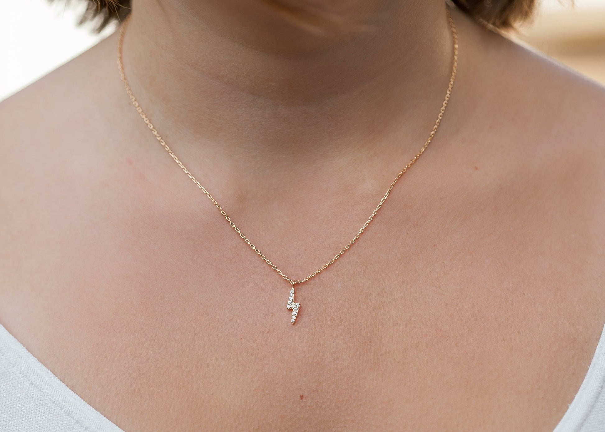 Collier petit éclair serti de zircons plaqué or