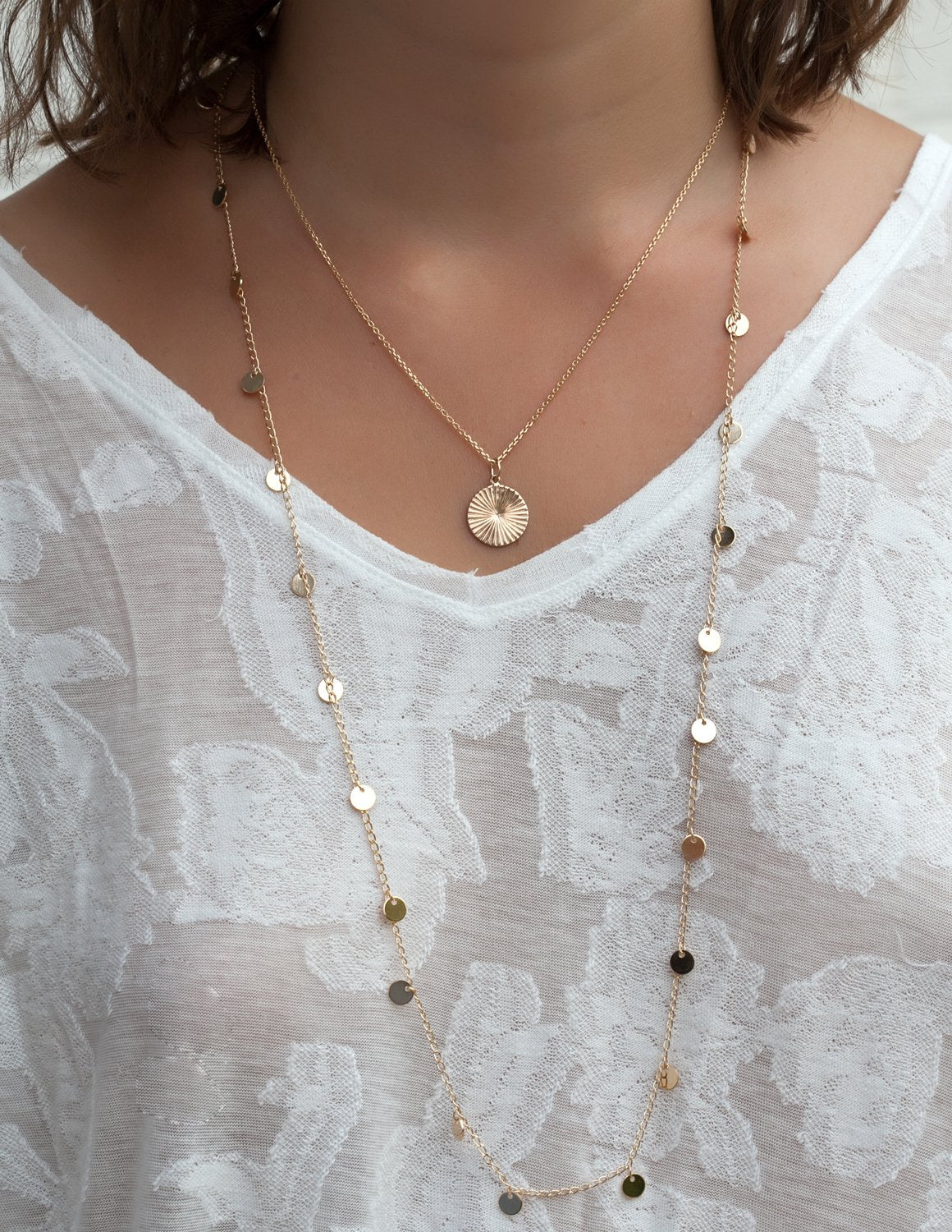 Collier médaille soleil plaqué or