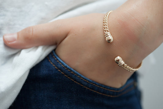 Bracelet jonc tressé avec boules plaqué or