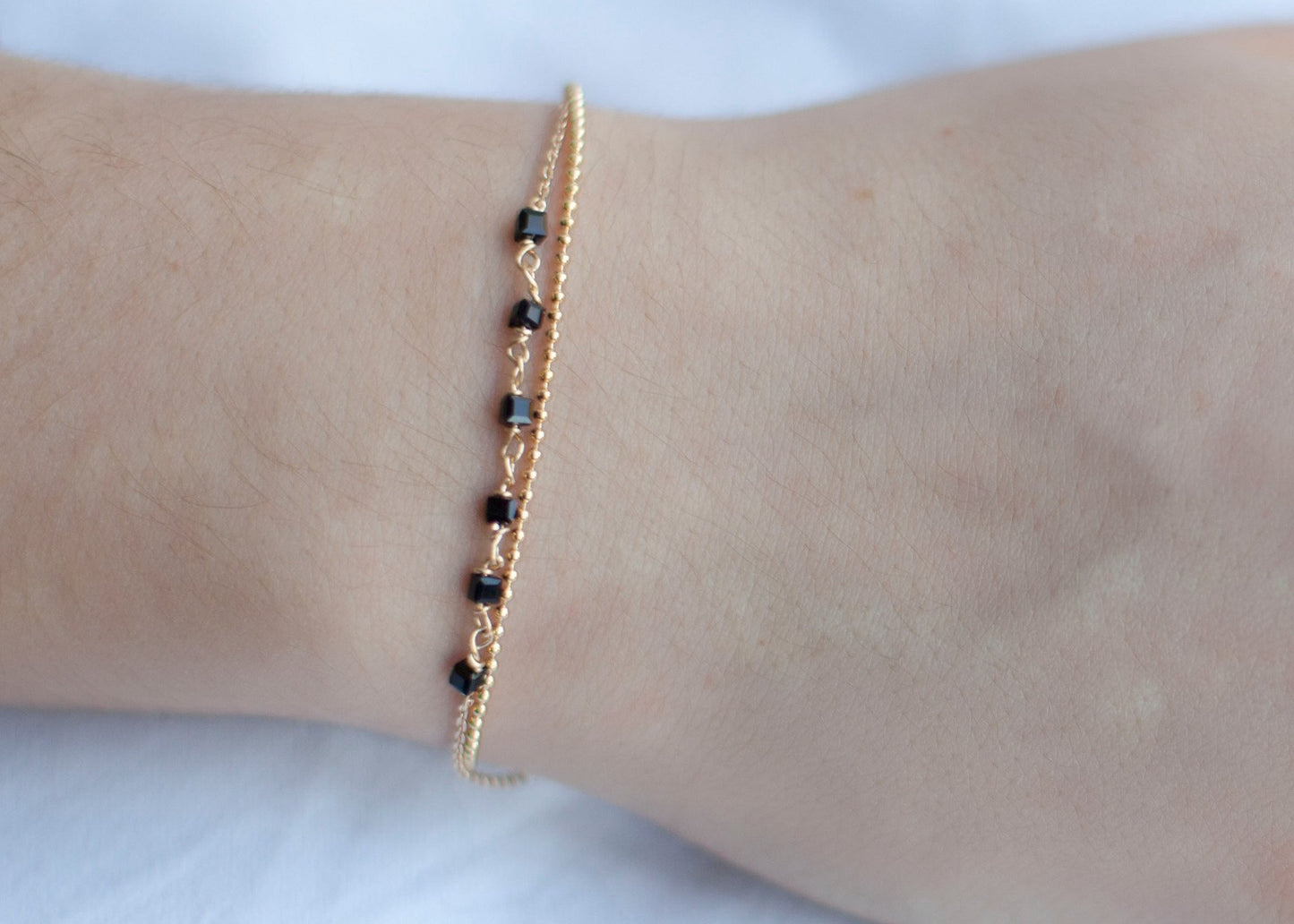Bracelet 2 rangs perles noires plaqué or