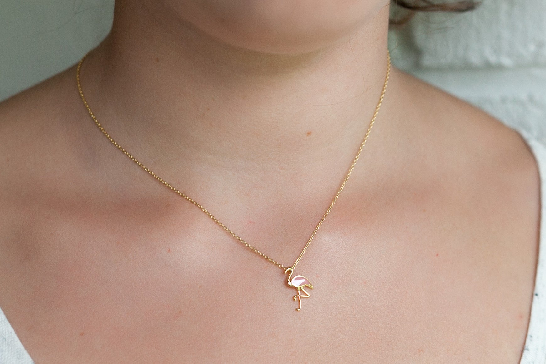 Collier flamant rose doré