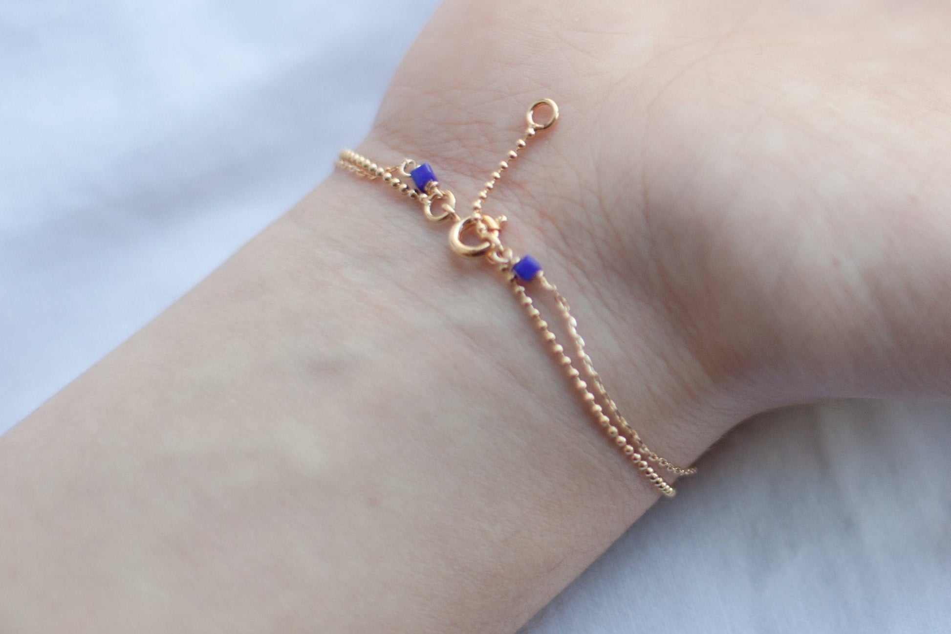 Bracelet 2 rangs perles bleues plaqué or