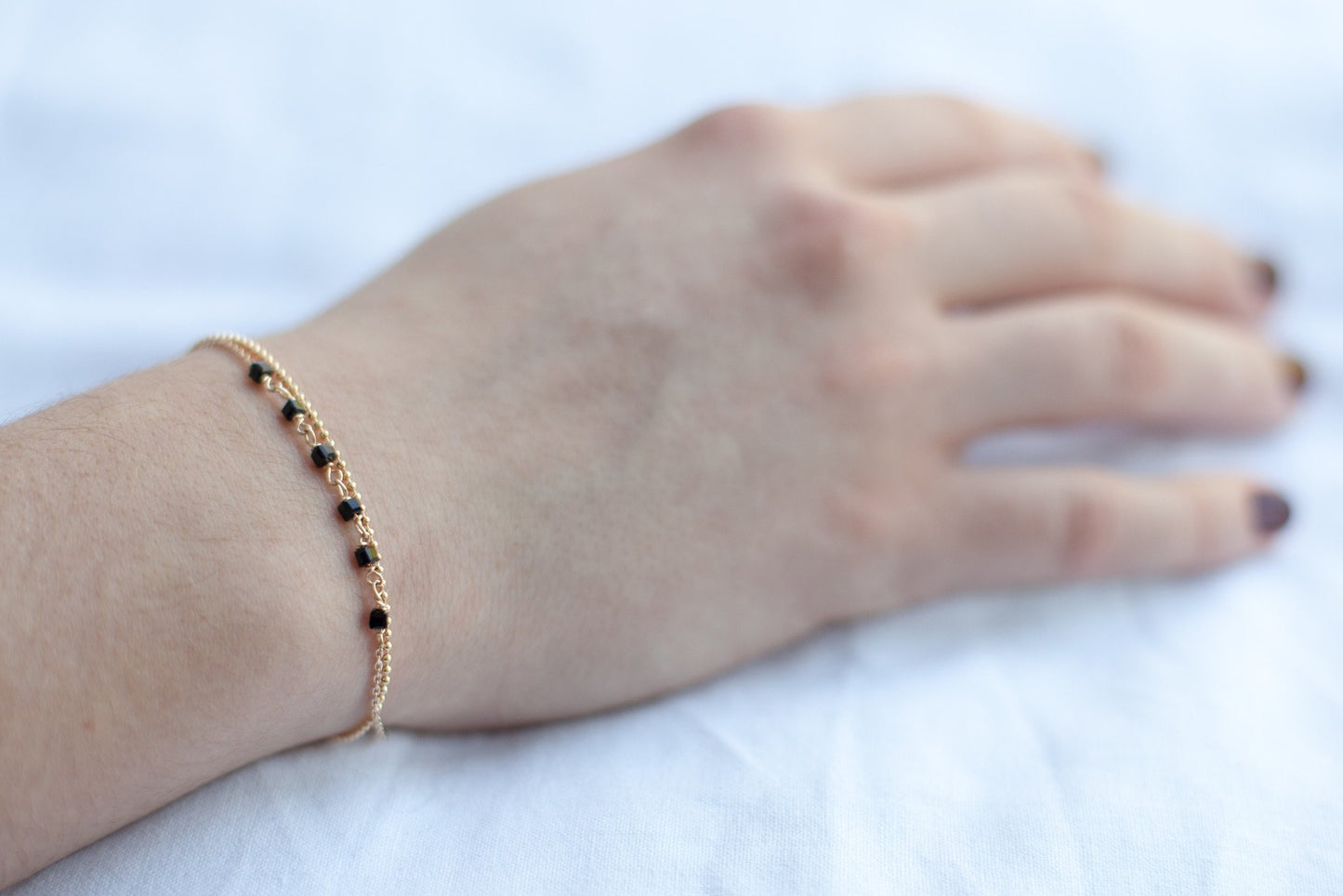 Bracelet 2 rangs perles noires plaqué or